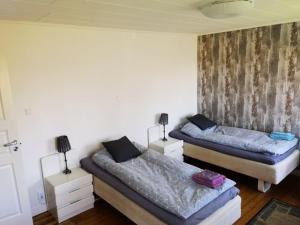 Postel nebo postele na pokoji v ubytování Falkenberg /Vinberg