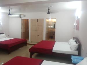 Postel nebo postele na pokoji v ubytování Hotel Nambi
