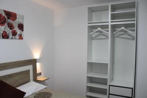 Ένα ή περισσότερα κρεβάτια σε δωμάτιο στο Alojamientos Centro Histórico de Ciudad Rodrigo
