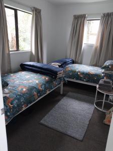 Voodi või voodid majutusasutuse Kea Retreat toas