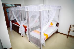 Letto o letti in una camera di BV Residence
