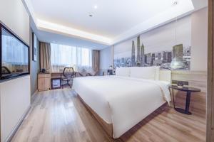 Postel nebo postele na pokoji v ubytování Atour Hotel Shanghai Lujiazui Babaiban