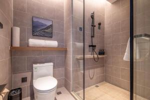 Ένα μπάνιο στο Atour Hotel Zhuhai Jinwan Airport +8 φωτογραφίες