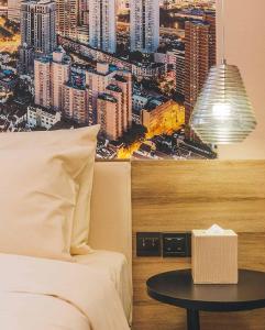 Postel nebo postele na pokoji v ubytování Atour Hotel Shanghai Lujiazui Babaiban