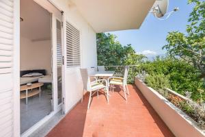Ein Balkon oder eine Terrasse in der Unterkunft Garden apartment
