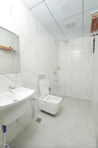 Koupelna v ubytování eCASA Home Stay + 26 fotografií