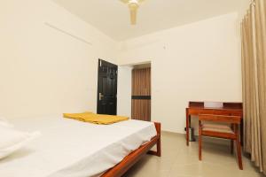 Postel nebo postele na pokoji v ubytování eCASA Home Stay