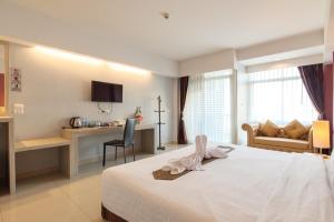 Postel nebo postele na pokoji v ubytování Tubtim Siam Suvarnabhumi Hotel