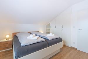 Postel nebo postele na pokoji v ubytování Anni