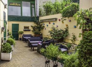 Vonkajšia záhrada v ubytovaní BoutiqueHOTEL Donauwalzer