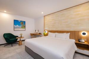 Postel nebo postele na pokoji v ubytování Petro House Vung Tau - Block A