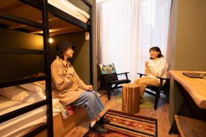 Postel nebo postele na pokoji v ubytování Glamping Tokyo Asakusa
