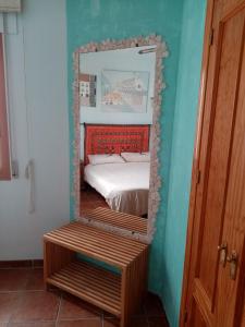 Posteľ alebo postele v izbe v ubytovaní Atico Frigiliana + 10 fotografií