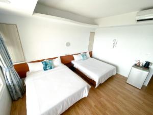 Letto o letti in una camera di 南鴻雅築South Home