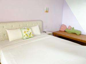 Letto o letti in una camera di 南鴻雅築South Home