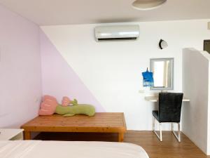 Letto o letti in una camera di 南鴻雅築South Home