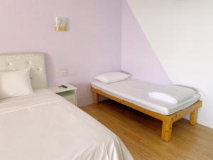 Letto o letti in una camera di 南鴻雅築South Home