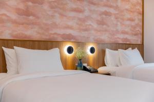Postel nebo postele na pokoji v ubytování Petro House Vung Tau - Block A
