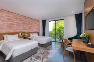 Postel nebo postele na pokoji v ubytování Petro House Vung Tau - Block A