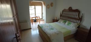 Posteľ alebo postele v izbe v ubytovaní Gira-sol villa