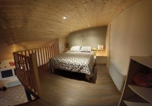 Posteľ alebo postele v izbe v ubytovaní Gîte avec spa et sauna Aux champs des Amours