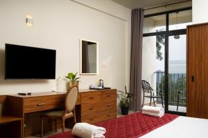 Voodi või voodid majutusasutuse Fern Tree Resort toas