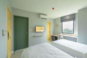 Легло или легла в стая в พิลโล่ อินน์ ฉะเชิงเทรา Pillow Inn Chachengsao