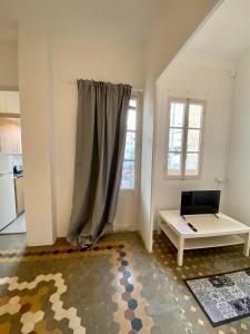 Et tv og/eller underholdning på Ruzafa Vibes Apartments