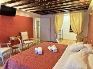 Ένα ή περισσότερα κρεβάτια σε δωμάτιο στο Ca' Giorgia