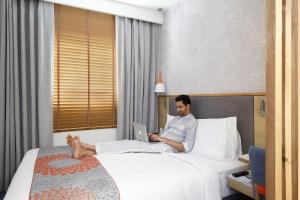 Posteľ alebo postele v izbe v ubytovaní Holiday Inn Express Pune Pimpri by IHG