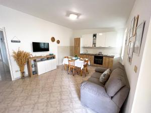 A kitchen or kitchenette at NaturAmare Apartments Palinuro