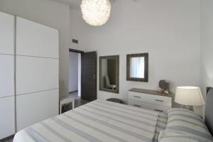 En eller flere senge i et værelse på Rif. A2 - Podere San Francesco