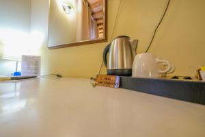 A kitchen or kitchenette at San Tommaso