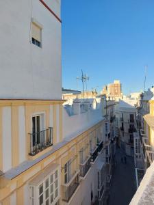 a view of a city street with buildings at Penthouse Torre del Mar Grupo AC Gestion in Cádiz