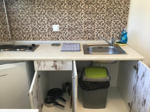 Kuchyň nebo kuchyňský kout v ubytování Be Happy Apartments