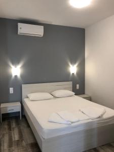 Postel nebo postele na pokoji v ubytování Be Happy Apartments