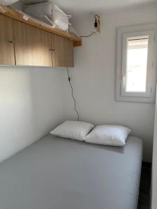 Posteľ alebo postele v izbe v ubytovaní Appartement T2, terrasse, parking privé proche port et plages
