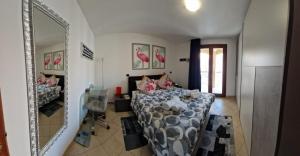 Ένα ή περισσότερα κρεβάτια σε δωμάτιο στο Sph24 - Appartamento via Lo Frasso