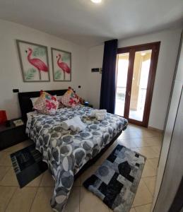 Ένα ή περισσότερα κρεβάτια σε δωμάτιο στο Sph24 - Appartamento via Lo Frasso