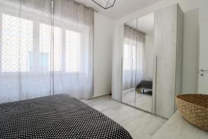 A bed or beds in a room at Rif. B3 - SAMUELE