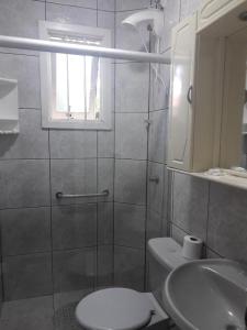 Kylpyhuone majoituspaikassa APARTAMENTOS BELLO VALE
