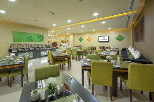 Restaurace v ubytování Al Khoory Hotel Apartments Al Barsha