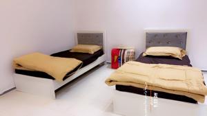 Krevet ili kreveti u jedinici u okviru objekta استراحات يمك دروبي