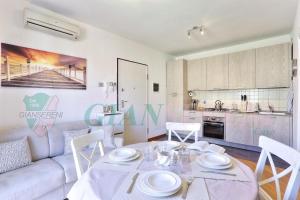 Køkken eller tekøkken på PIANOSA - Elegante appartamento sul mare