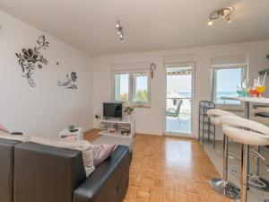 Μια τηλεόραση ή/και κέντρο ψυχαγωγίας στο Apartments Lilly