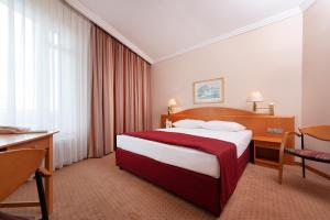 Postel nebo postele na pokoji v ubytování Hotel Meerane + 30 fotografií