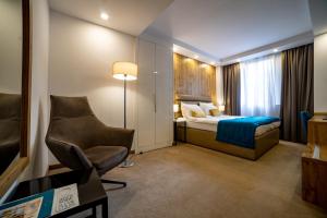 Postel nebo postele na pokoji v ubytování MARK Hotel + 37 fotografií