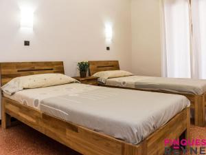 Postel nebo postele na pokoji v ubytování Sant pere 11