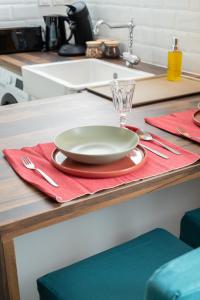 a plate on a red napkin on a kitchen counter at Le Selah in Tourcoing