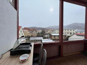 a balcony with a view of a city at Family Apartments Thale in Thale